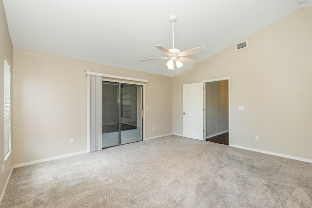 867 S Patrick Dr, Satellite Beach, FL 32937 - carpeted empty room with ceiling fan and lofted ceiling