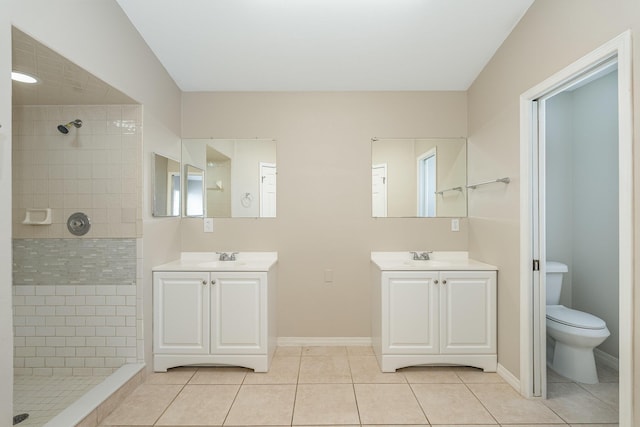 867 S Patrick Dr, Satellite Beach, FL 32937 - full bath with tile patterned flooring, vanity, and a tile shower