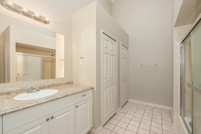 867 S Patrick Dr, Satellite Beach, FL 32937 - bathroom with vanity and tile patterned floors
