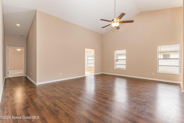 867 S Patrick Dr, Satellite Beach, FL 32937 - empty room with a ceiling fan, dark wood finished floors, high vaulted ceiling, and recessed lighting