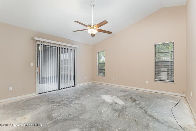 867 S Patrick Dr, Satellite Beach, FL 32937 - spare room with ceiling fan, concrete flooring, and high vaulted ceiling