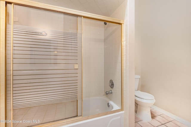 867 S Patrick Dr, Satellite Beach, FL 32937 - bathroom with tile patterned floors and shower / bath combination with glass door