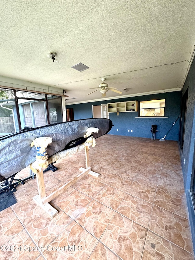 view of patio with ceiling fan