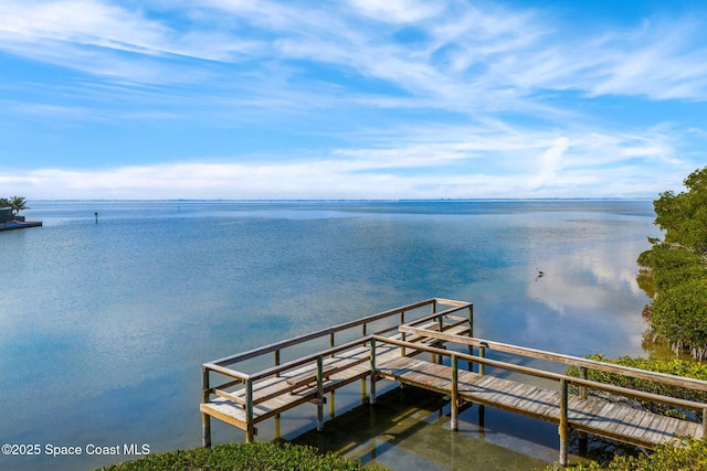 view of dock with a water view