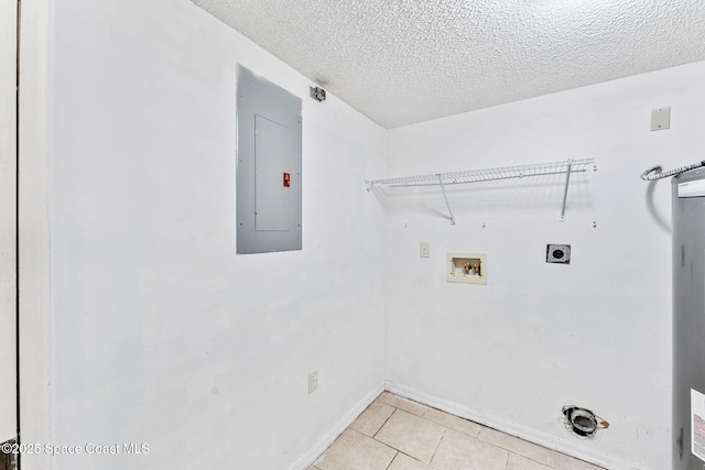 laundry room featuring light tile patterned floors, electric dryer hookup, hookup for a washing machine, electric panel, and a textured ceiling