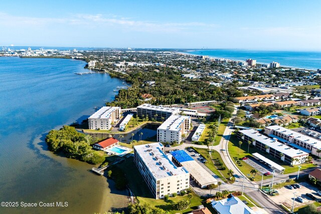 birds eye view of property featuring a water view