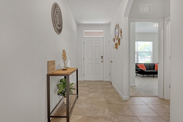 view of tiled entrance foyer