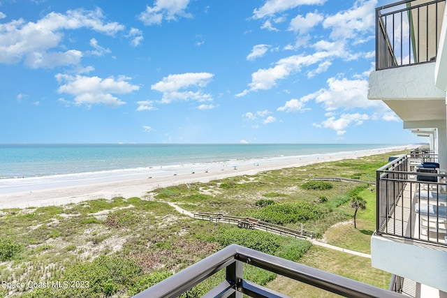 view of water feature with a beach view