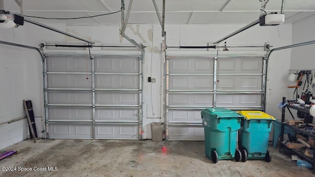 garage featuring a garage door opener