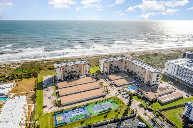 aerial view with a beach view and a water view