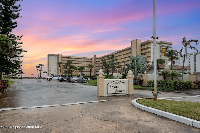 view of outdoor building at dusk