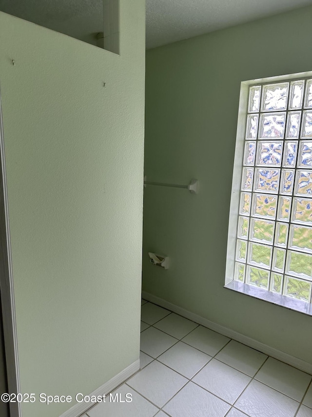 bathroom featuring tile patterned flooring