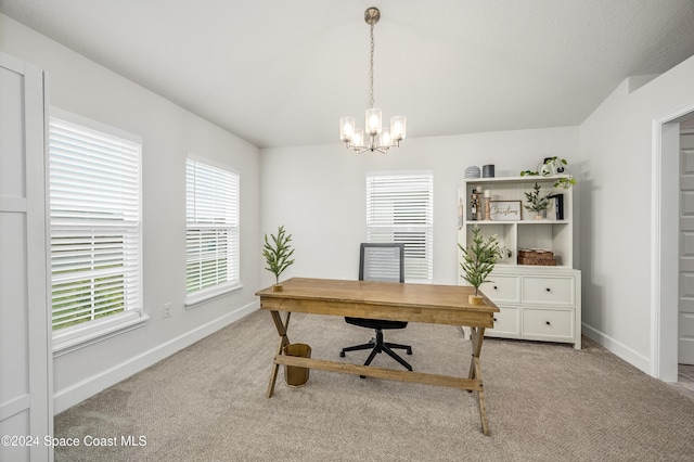 office area featuring a chandelier and light colored carpet