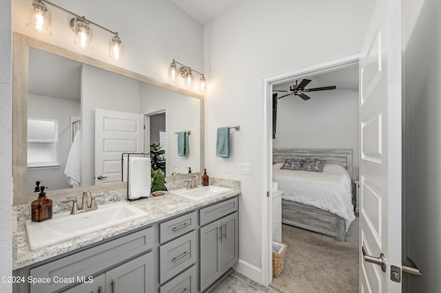 bathroom featuring vanity and ceiling fan