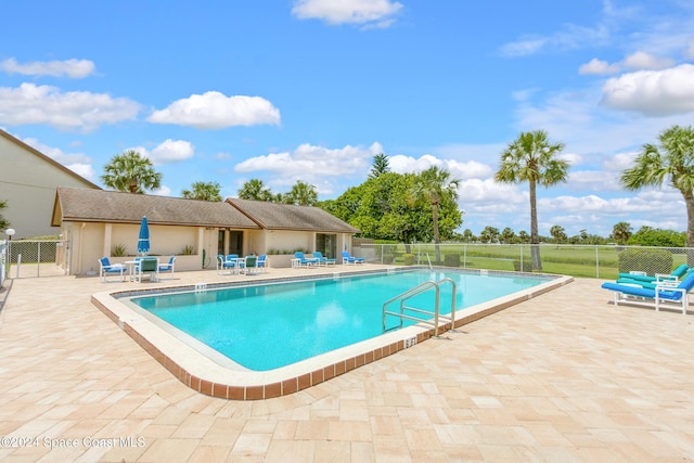 view of pool with a patio area