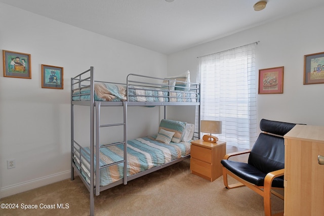 bedroom featuring carpet flooring