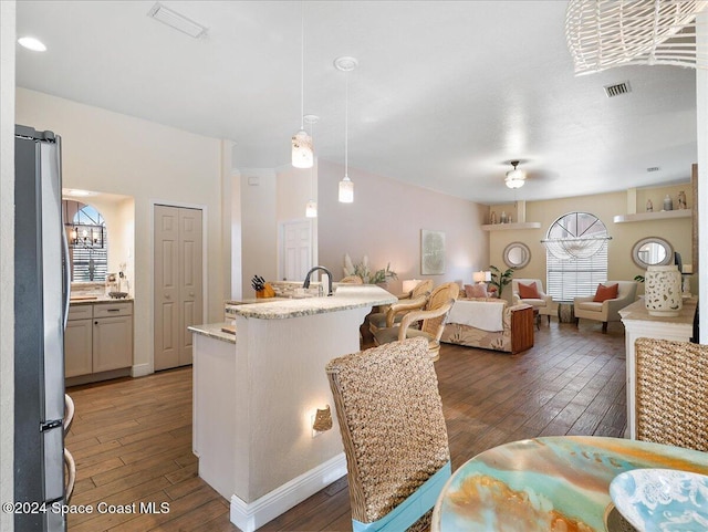 dining area featuring dark hardwood / wood-style floors