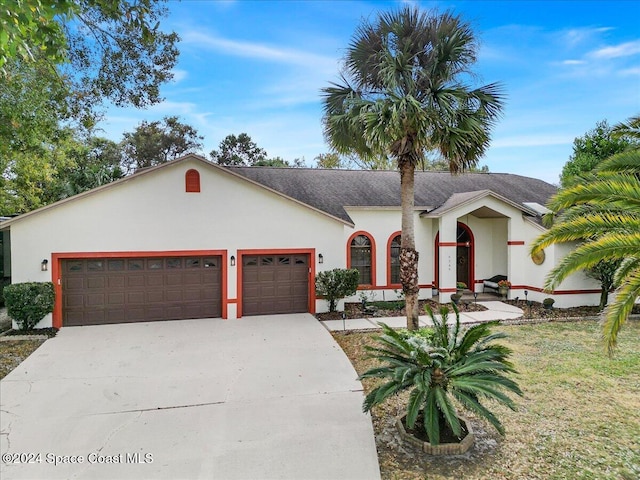 view of front of property featuring a garage