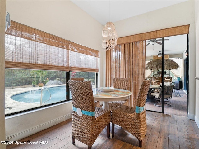 dining area featuring hardwood / wood-style floors and ceiling fan