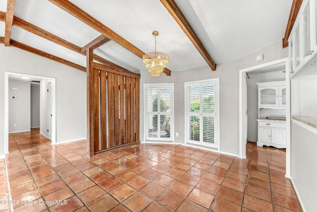 interior space with light tile patterned floors, lofted ceiling with beams, a textured ceiling, and an inviting chandelier