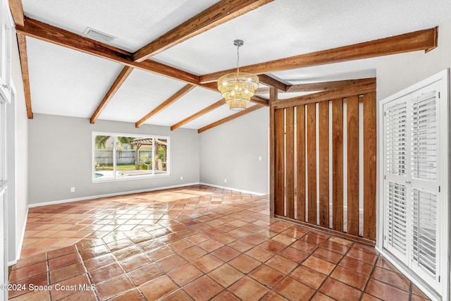 unfurnished living room featuring a chandelier, a textured ceiling, vaulted ceiling with beams, and tile patterned floors