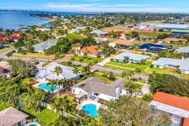 bird's eye view with a water view