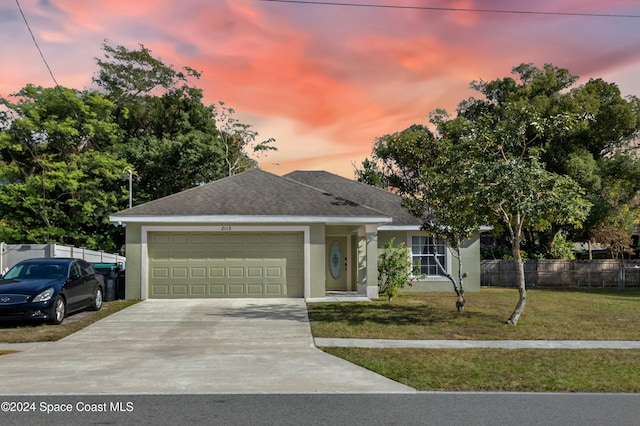 8113 Eden Park Rd, Orlando, FL 32810 - ranch-style home featuring driveway, a shingled roof, stucco siding, and a garage