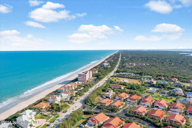 aerial view featuring a beach view and a water view