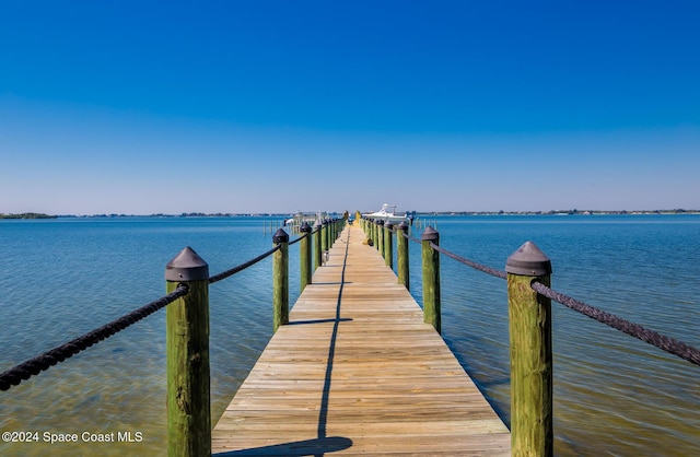 view of dock with a water view