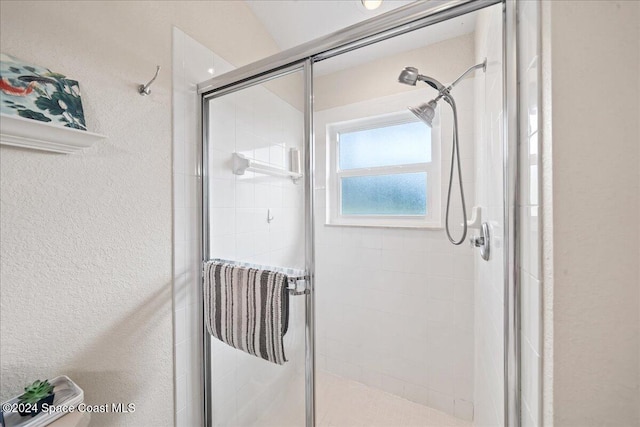 bathroom with an enclosed shower