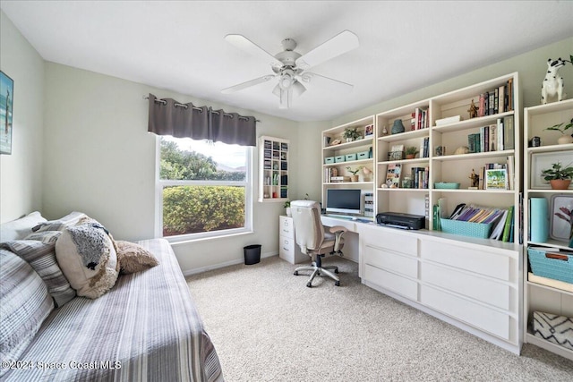 bedroom with light colored carpet and ceiling fan