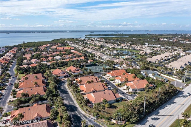 drone / aerial view with a water view