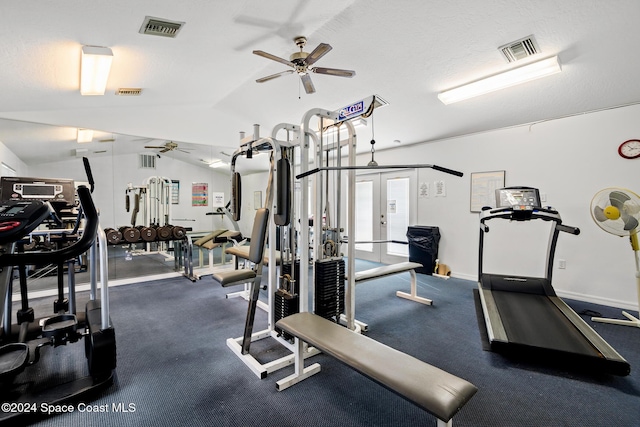 exercise room featuring ceiling fan and lofted ceiling