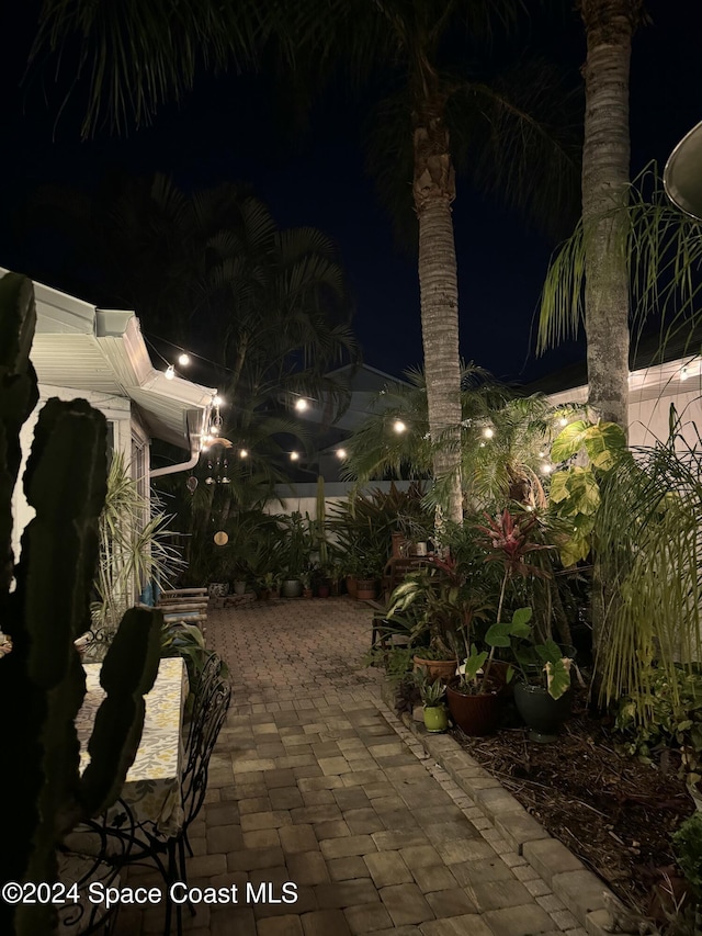 view of patio at night