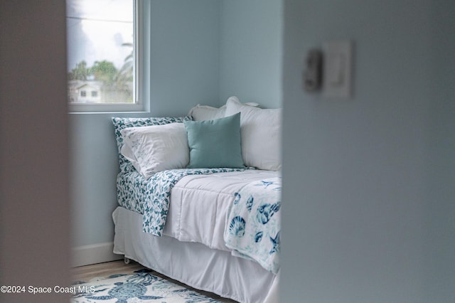 bedroom featuring wood-type flooring