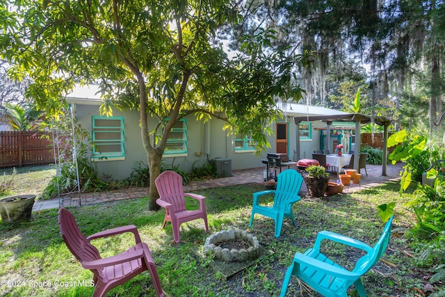 back of house with a patio area