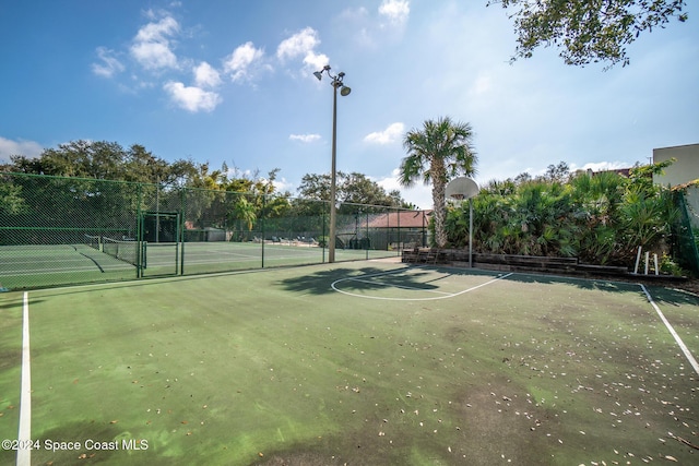 exterior space featuring tennis court