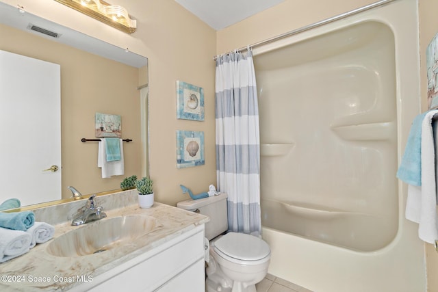 full bathroom featuring toilet, shower / tub combo, vanity, and tile patterned floors