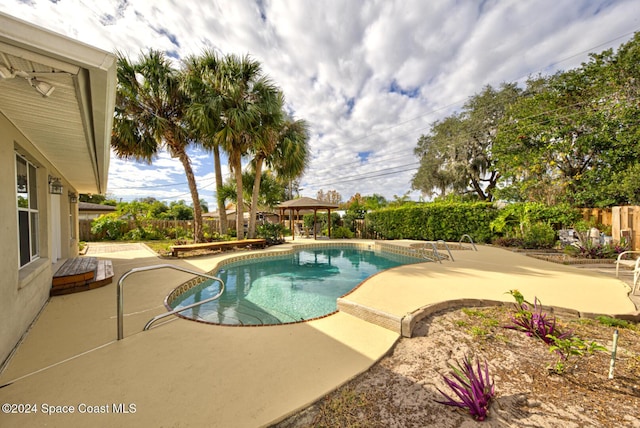 view of pool with a gazebo and a patio