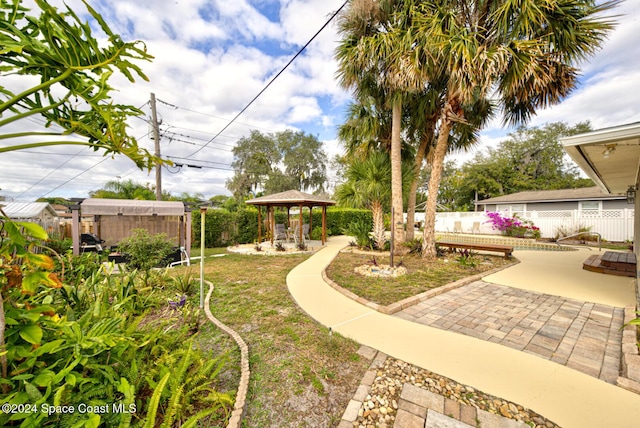 view of yard with a gazebo and a patio