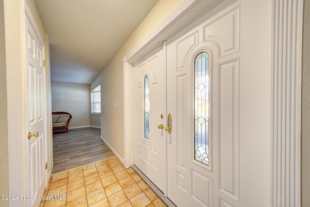 entrance foyer with light wood-type flooring