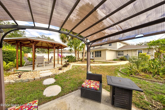 view of yard featuring a gazebo and a patio