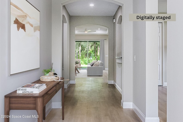 hall featuring hardwood / wood-style flooring