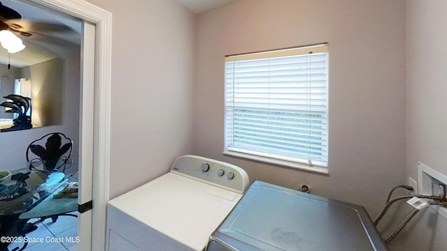 laundry area with separate washer and dryer and ceiling fan