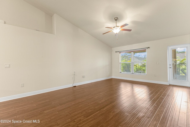 spare room with ceiling fan, dark hardwood / wood-style flooring, and high vaulted ceiling