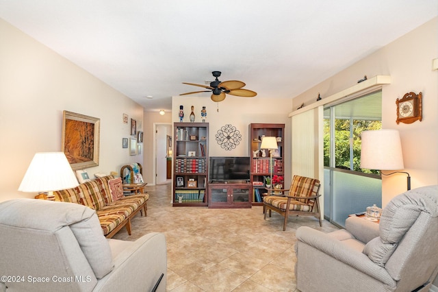 tiled living room with ceiling fan