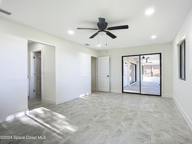 empty room featuring ceiling fan