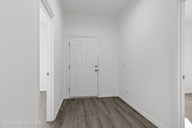 corridor featuring hardwood / wood-style flooring