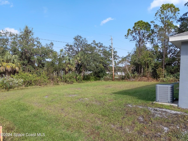 view of yard featuring cooling unit