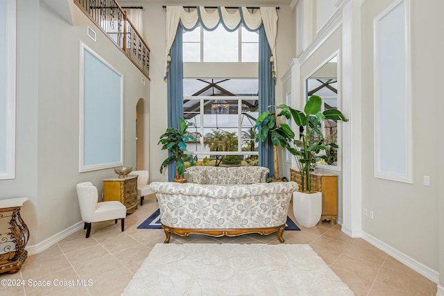 living area with tile patterned flooring